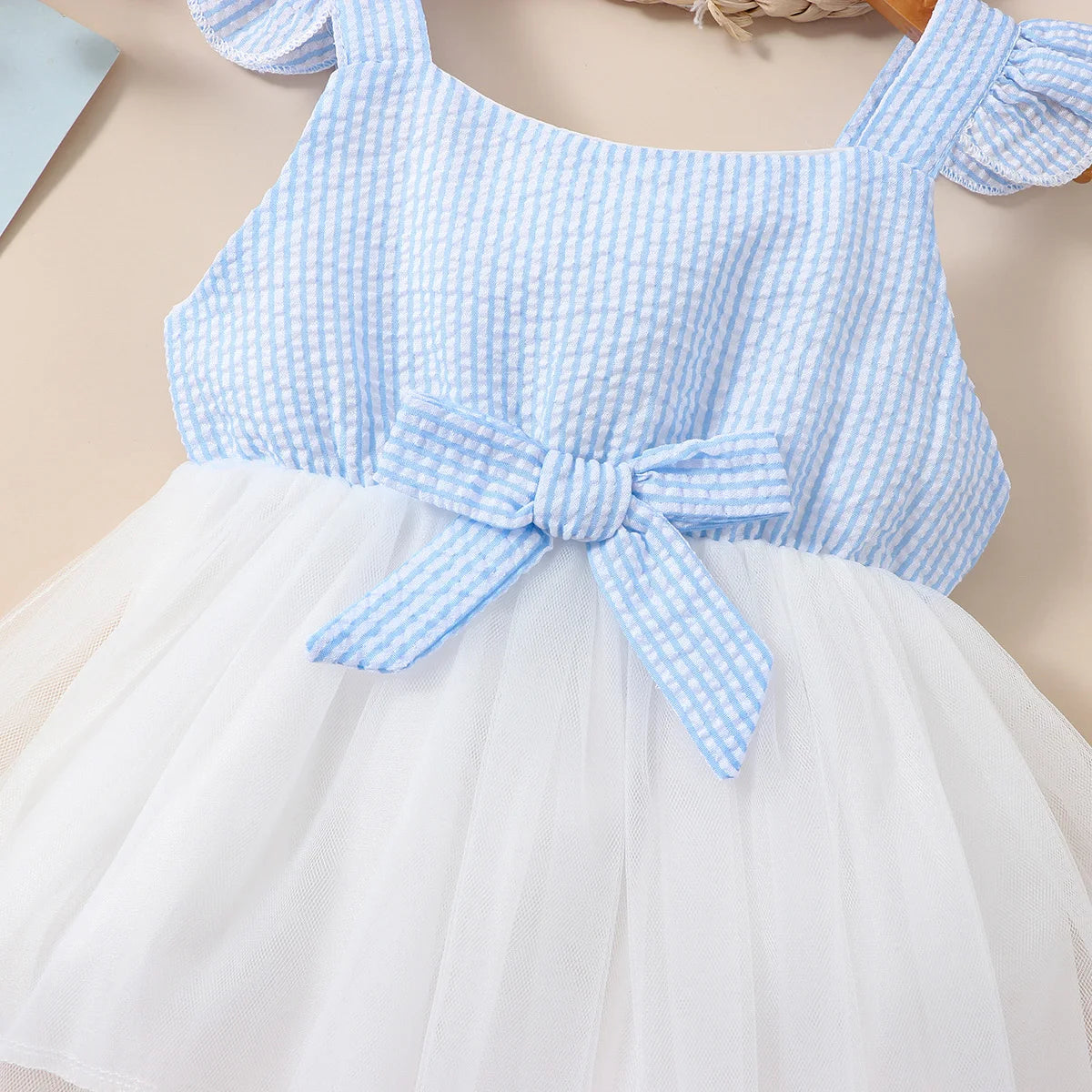 Stylish Girl Blue Striped Dress with Bow Detail for Summer