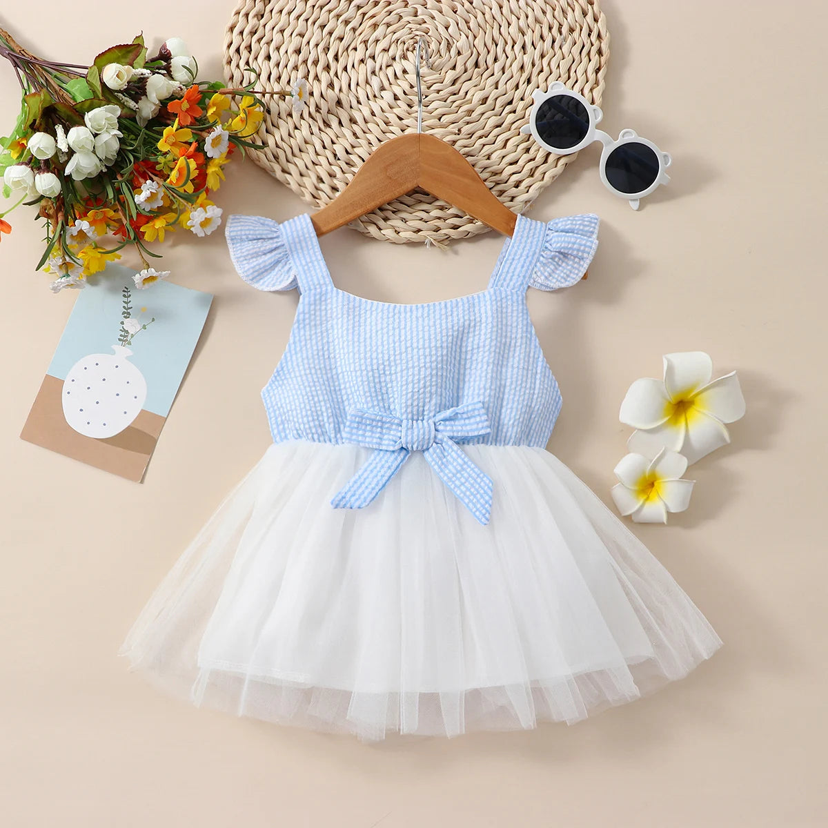 Stylish Girl Blue Striped Dress with Bow Detail for Summer